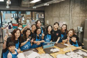 Smith's Hong Kong Employees Baking Cookies With Dignity Kitchen